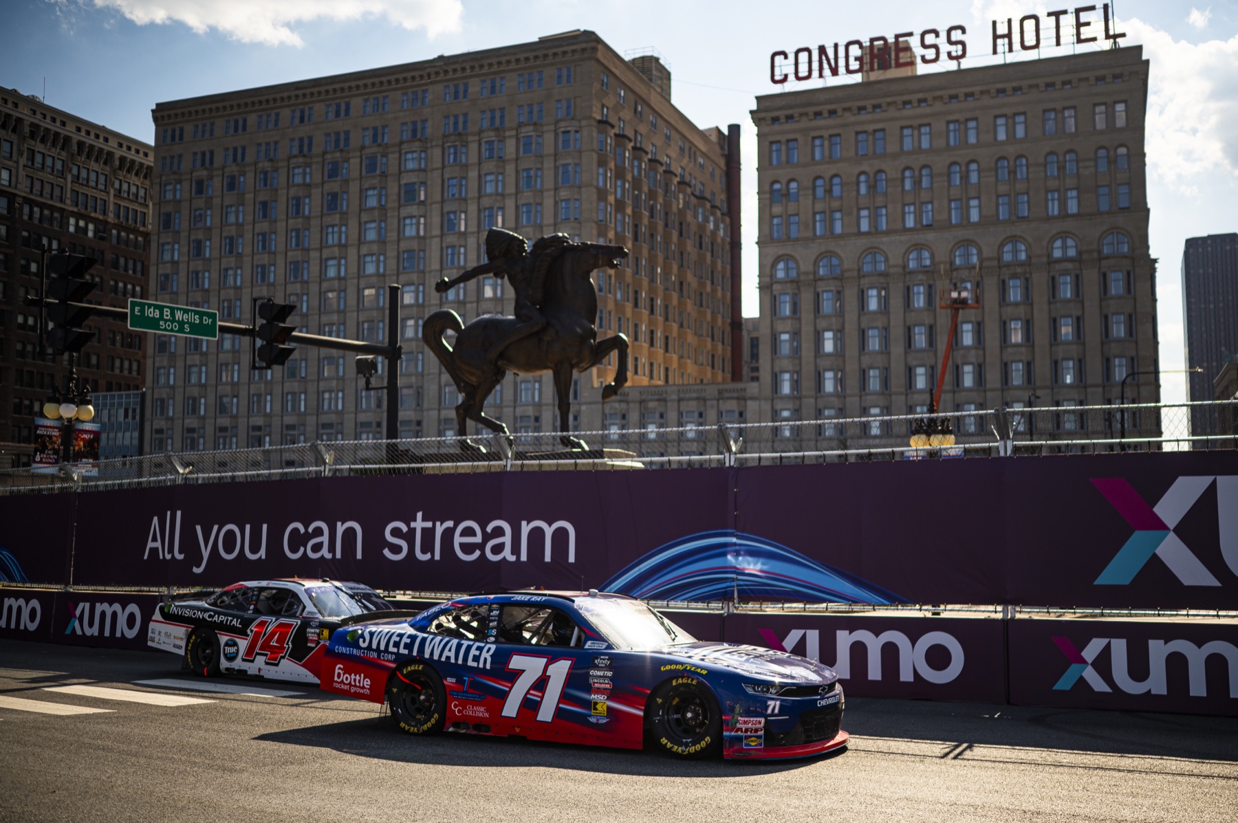 Ryan Ellis Racing number 71 car with Bottle Rocket Growth branding beneath the Congress Hotel sign in Chicago
