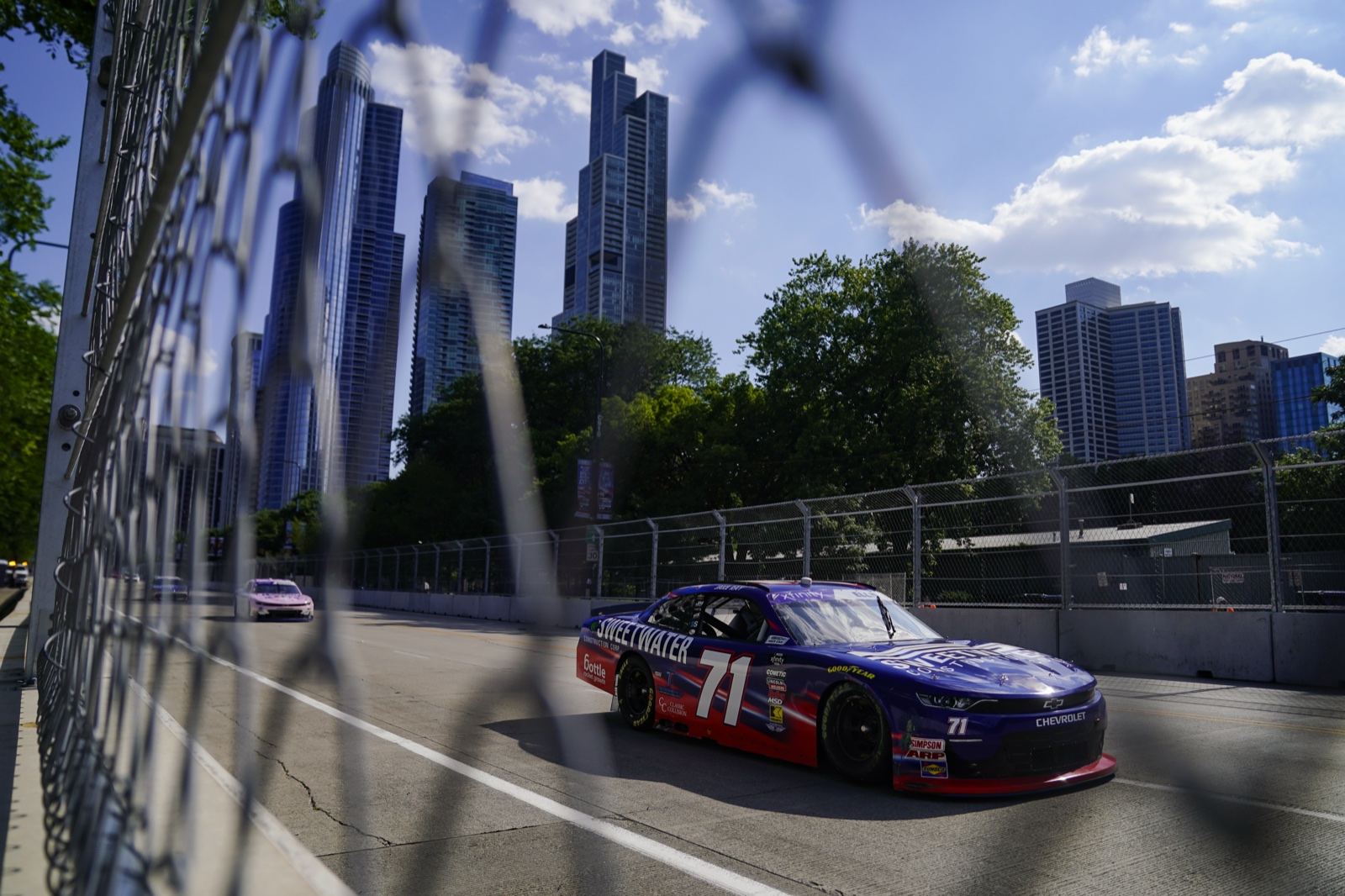Ryan Ellis Racing number 71 car carrying Bottle Rocket Growth branding with the Chicago skyline behind it