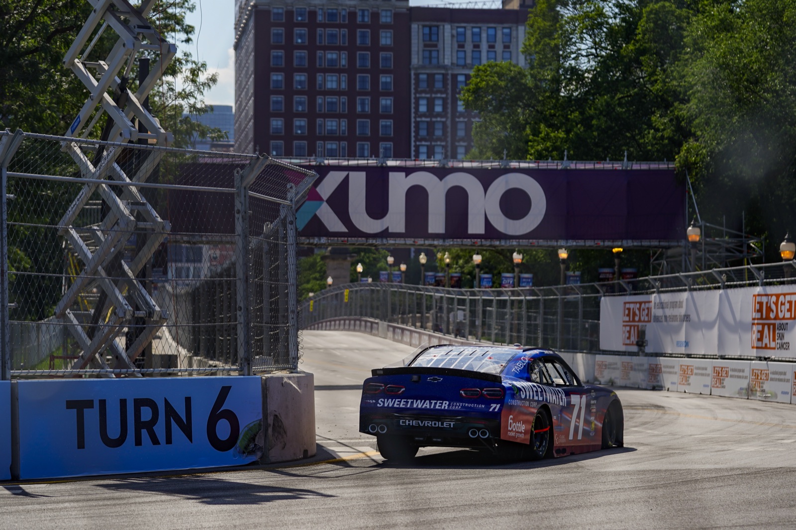 Ryan Ellis Racing number 71 car carrying Bottle Rocket Growth branding through turn 6 in Chicago