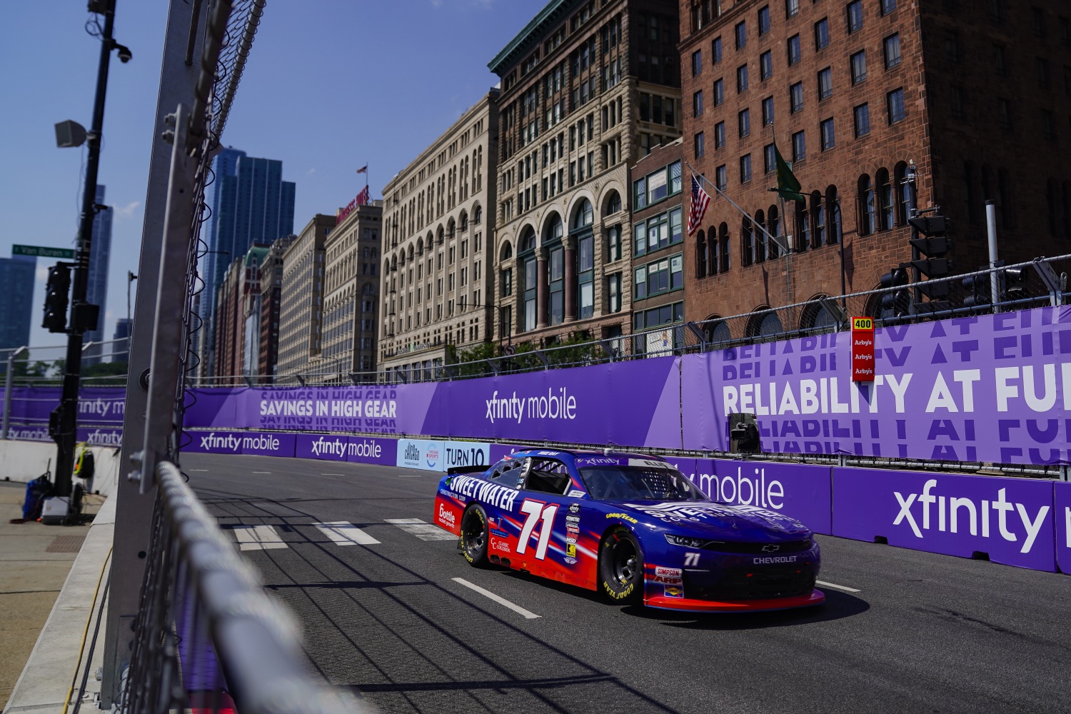 Ryan Ellis Racing number 71 car carrying Bottle Rocket Growth branding through turn 10 in Chicago